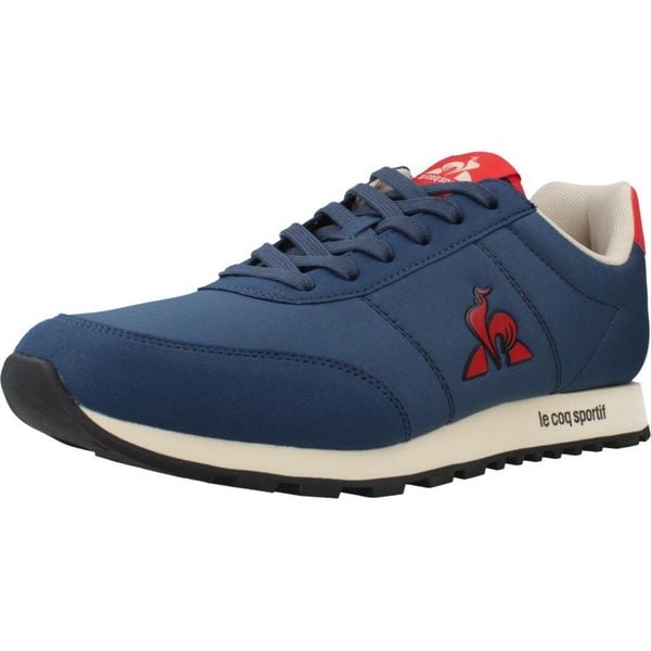 Buty LE COQ SPORTIF RACERONE_2 Niebieski. Niebieskie buty trekkingowe le coq sportif, bez wzorów, z syntetyku, bez zapięcia. Za 190.99 zł.