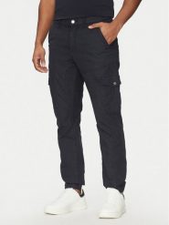 Guess Spodnie materiałowe M5RB54 WGXY1 Granatowy Slim Fit. Niebieskie spodnie materiałowe Guess, m, z aplikacjami, z bawełny. Za 359.99 zł.