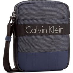 Saszetka CALVIN KLEIN - Madox Reporter K50K502853 411. Saszetki i nerki marki CALVIN KLEIN. W wyprzedaży za 329.00 zł.