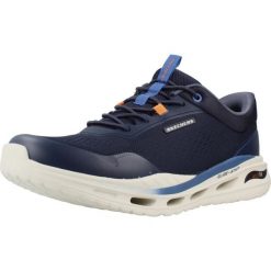 Buty SKECHERS ARCH FIT ORVAN HUNTER Niebieski. Niebieskie buty turystyczne Skechers, bez wzorów, z tkaniny, bez zapięcia, trekkingowe. Za 293.99 zł.