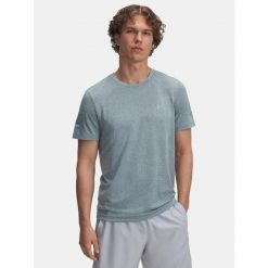 Koszulka do biegania męska Under Armour Seamless Stride. Zielone buty do biegania Under Armour, bez wzorów, bez zapięcia, do biegania. Za 159.99 zł.