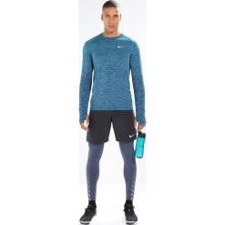 Nike Performance POWER FLASH TECH Legginsy thunder blue/reflect black/silver. Spodnie treningowe długie Nike Performance, z elastanu. W wyprzedaży za 209.25 zł.
