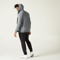 Bluza na zamek z kapturem męska Domyos Gym & Pilates 100. Szare bluzy DOMYOS, m, bez wzorów, z bawełny, z kapturem. Za 89.99 zł.