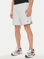 Reebok Szorty sportowe Strength 100075594 Szary Regular Fit. Szare krótkie spodenki sportowe Reebok, l, bez wzorów, z syntetyku. Za 109.99 zł.