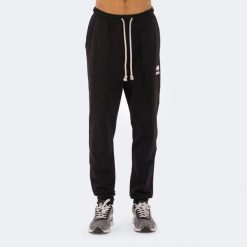 Spodnie Errea Denali. Czarne spodnie treningowe długie ERREA, m, bez wzorów, z bawełny. Za 245.95 zł.