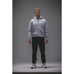 Kurtka z kapturem Erima Cmpt Wings Szara Junior. Czarne kurtki Erima, bez wzorów, z materiału, z kapturem. Za 329.99 zł.