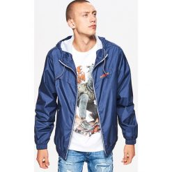 Kurtka typu wiatrówka - Granatowy. Kurtki marki B'TWIN. W wyprzedaży za 69.99 zł.