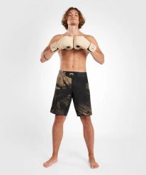 Venum Spodenki MMA Gorilla Jungle. Czarne krótkie spodenki sportowe VENUM, m, bez wzorów, z elastanu. Za 350.19 zł.