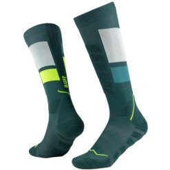 Skarpetki sportowe dla dorosłych Thermonet Over The Calf Socks. Zielone skarpetki sportowe Buff, bez wzorów, z elastanu. Za 149.99 zł.