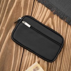 Męska skórzana saszetka na pasek do ręki czarna ABR-53. Czarne torby na ramię bez wzorów, ze skóry, do ręki, bez dodatków. Za 57.81 zł.