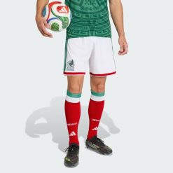Spodenki domowe Meksyk 26. Białe krótkie spodenki sportowe Adidas, l, bez wzorów, z materiału. Za 199.00 zł.