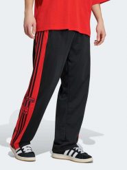 Adidas Spodnie dresowe w kolorze czarnym rozmiar: S. Czarne spodnie treningowe długie Adidas, s, bez wzorów, z dresówki. Za 179.95 zł.