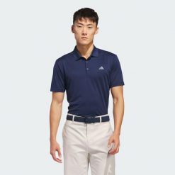 Koszulka Adi Performance Polo. Niebieskie koszulki polo Adidas, m, bez wzorów, z materiału, bez kołnierzyka, bez ramiączek, na golfa. Za 229.00 zł.