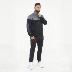 Dres sportowy kompletny UCLA męski. Czarne komplety dresowe Legea, l, bez wzorów, z dresówki, bez ramiączek. W wyprzedaży za 147.50 zł.