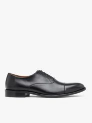 Czarne półbuty wizytowe premium. Czarne eleganckie półbuty Ryłko, bez wzorów, ze skóry, bez obcasa, na płaskiej podeszwie, bez zapięcia. Za 599.99 zł.
