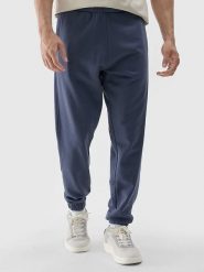 4F Spodnie dresowe w kolorze granatowym rozmiar: L. Niebieskie spodnie treningowe długie 4F, l, bez wzorów, z dresówki. Za 108.74 zł.
