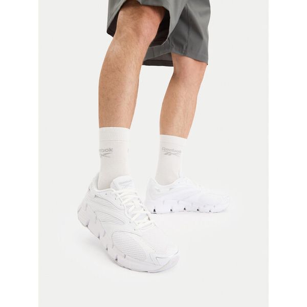 Buty do biegania Reebok. Białe buty do biegania Reebok, bez wzorów, bez zapięcia, do biegania. Za 389.99 zł.