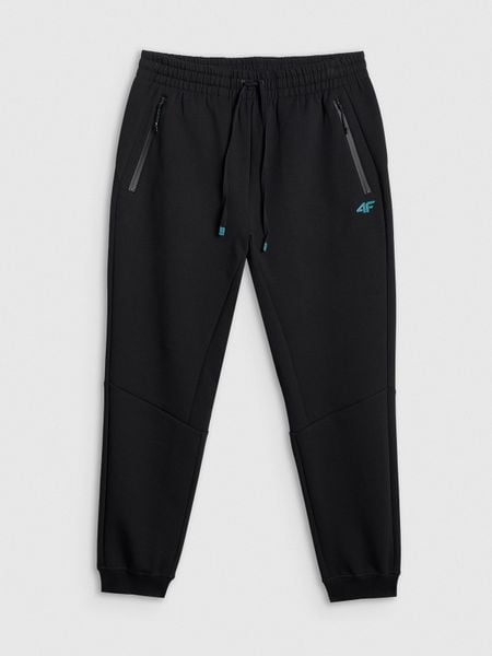 4F Spodnie dresowe joggery męskie - czarne XL. Czarne spodnie materiałowe 4F, na co dzień, m, bez wzorów, z bawełny. Za 179.99 zł.