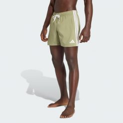 Szorty do pływania 3-Stripes. Niebieskie krótkie spodenki sportowe Adidas, m, bez wzorów, z materiału. Za 149.00 zł.