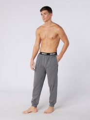 DKNY Spodnie dresowe w kolorze szarym rozmiar: L. Szare spodnie treningowe długie DKNY, l, bez wzorów, z bawełny. Za 100.75 zł.