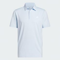 Koszulka polo Ultimate365 Solid. Niebieskie koszulki polo Adidas, m, bez wzorów, z materiału, bez kołnierzyka, bez ramiączek, na golfa. Za 259.00 zł.