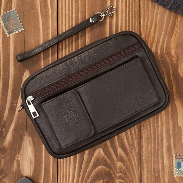 Saszetka męska skórzana do ręki z miejscem na telefon brązowa Paolo Peruzzi T-132-BR. Brązowe torby na ramię bez wzorów, z materiału, do ręki, bez dodatków. Za 119.00 zł.