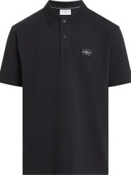 Calvin Klein Koszulka polo w kolorze czarnym rozmiar: S. Czarne koszulki polo CALVIN KLEIN, s, bez wzorów, bez kołnierzyka, bez ramiączek. Za 217.99 zł.