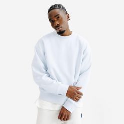 Bluza okrągły dekolt męska Elementals. Niebieskie bluzy Decathlon, m, bez wzorów, z bawełny, bez kaptura. W wyprzedaży za 119.99 zł.