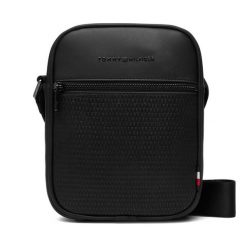 Saszetka Tommy Hilfiger. Czarne torby na ramię Tommy Hilfiger, bez wzorów, małe, bez dodatków. Za 369.99 zł.