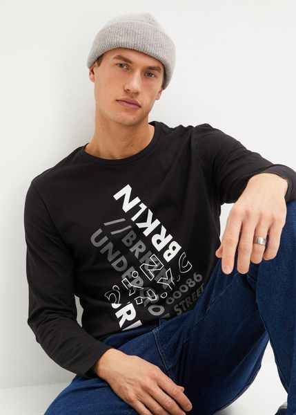 Bluzka z długim rękawem z czystej bawełny organicznej. Czarne bluzki z długim rękawem bonprix, m, bez wzorów, z bawełny, bez kołnierzyka, bez ramiączek. Za 62.99 zł.