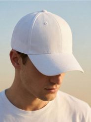 Bawełniana czapka z daszkiem - biały. Białe czapki z daszkiem Sinsay, bez wzorów, z bawełny. Za 9.99 zł.