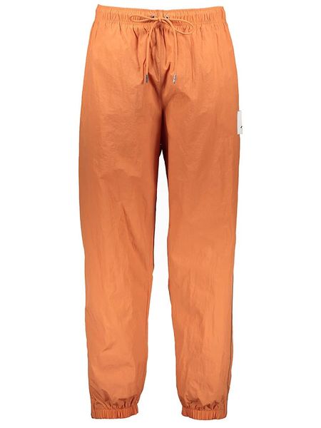 Air Jordan Spodnie dresowe "Essential" w kolorze pomarańczowym rozmiar: XL. Pomarańczowe spodnie treningowe długie AIR JORDAN, xl, bez wzorów, z dresówki. Za 235.95 zł.