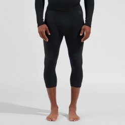 Legginsy termiczne męskie Performance Warm Eco Bl Bottom 3/4. Czarne legginsy długie sportowe ODLO, m, bez wzorów, z dzianiny, narciarskie. Za 270.56 zł.