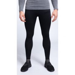 Getry treningowe męskie SPMF001 - głęboka czerń. Legginsy długie sportowe marki 4F. W wyprzedaży za 149.99 zł.