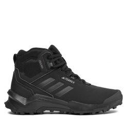 Trekkingi adidas. Czarne botki sznurowane Adidas, bez wzorów, bez obcasa, bez zapięcia. Za 479.99 zł.