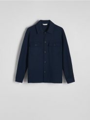 Gładka koszula regular fit - granatowy. Niebieskie koszule Reserved, l, bez wzorów, z dzianiny, bez kołnierzyka, bez ramiączek. Za 179.99 zł.