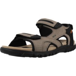 Sandały GEOX UOMO SANDAL STRADA Brązowy. Brązowe sandały Geox, z syntetyku, bez zapięcia. Za 316.99 zł.