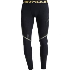 Under Armour ZONAL COMPETITION Legginsy black/iridescent foil. Spodnie treningowe długie marki Under Armour, z elastanu. W wyprzedaży za 295.20 zł.