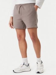 Tommy Jeans Szorty sportowe DM0DM21931 Beżowy Regular Fit. Brązowe krótkie spodenki sportowe Tommy Jeans, l, bez wzorów, z bawełny. Za 189.99 zł.