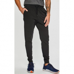 Under Armour - Spodnie Terry. Spodnie treningowe długie Under Armour. W wyprzedaży za 199.90 zł.