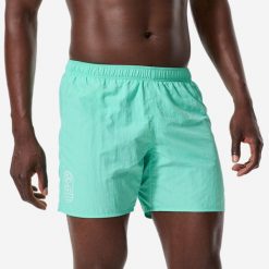 Szorty pływackie męskie Decathlon Basic. Zielone szorty Decathlon, m, bez wzorów, z materiału, sportowe. Za 39.99 zł.