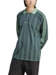 Adidas Sportowa koszulka polo w kolorze turkusowym rozmiar: M. Niebieskie koszulki polo Adidas, m, bez wzorów, z materiału, bez kołnierzyka, bez ramiączek, outdoorowe. Za 133.29 zł.