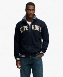 Superdry Vintage Athletic kurtka dresowa luźny krój. Niebieskie kurtki Superdry, xl, z aplikacjami, z bawełny, bez kaptura. Za 408.75 zł.