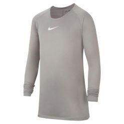 Koszulka Termoaktywna Juniorska Nike First Layer. Szare bielizna termoaktywna Nike, bez wzorów, bez ramiączek, do piłki nożnej. Za 97.90 zł.