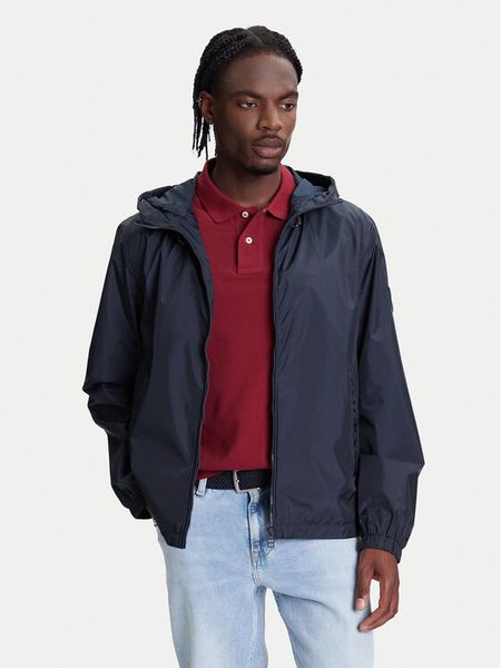 Tommy Hilfiger Kurtka przejściowa MW0MW40225 Granatowy Regular Fit. Niebieskie kurtki Tommy Hilfiger, m, bez wzorów, z syntetyku, bez kaptura. Za 639.00 zł.