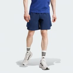 Szorty Manchester United Seasonal Cargo. Niebieskie szorty Adidas, xl, bez wzorów, z materiału, sportowe. Za 279.00 zł.