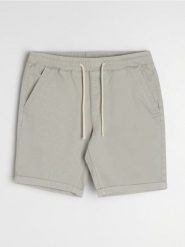 Szorty jeansowe jogger - kremowy. Białe krótkie spodenki sportowe Sinsay, l, bez wzorów, z jeansu. W wyprzedaży za 29.99 zł.