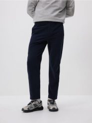Spodnie joggery - granatowy. Niebieskie joggery i bojówki Reserved, l, bez wzorów, z bawełny. Za 149.99 zł.