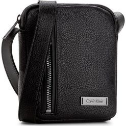 Saszetka CALVIN KLEIN BLACK LABEL - Adam Mini Reporter K50K503201 001. Saszetki i nerki marki Calvin Klein Black Label. W wyprzedaży za 259.00 zł.
