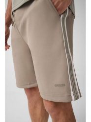 Guess Spodnie materiałowe 183578 Zielony Bermuda Fit. Zielone spodnie materiałowe Guess, m, z aplikacjami, z materiału. Za 344.99 zł.